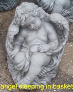 angel sleeping in basket