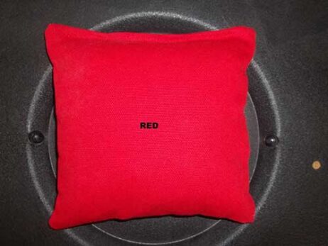 red cornhole bag