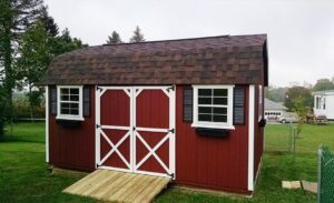Erie-PA-Storage-Sheds-Highwall-Barn-Wood-Siding-Jamestown-Red-paint-Dark-Brown-shingles-943x576