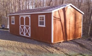 Erie-PA-Storage-sheds-Red-Mahogany-Stain-White-trim-Black-Shingles-943x576
