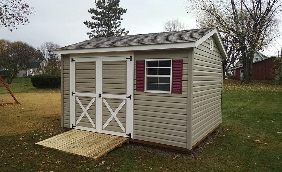 Rustic-Clay-vinyl-siding-gable-style-storage-building-943x576