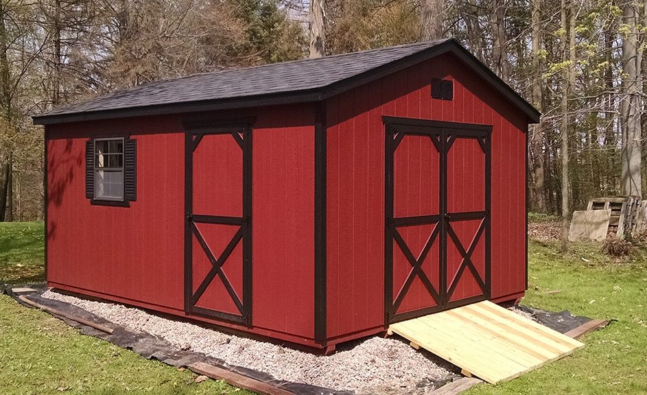 gable-storage-shed-wood-siding-jamestown-red-paint-black-trim-943x576