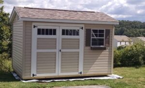 vinyl-storage-shed-natural-sand-siding-with-driftwood-shingles-Meadville-pa-943x576