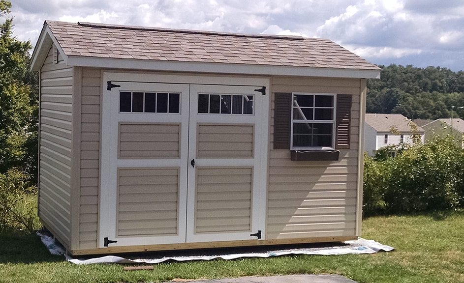 vinyl-storage-shed-natural-sand-siding-with-driftwood-shingles-Meadville-pa-943x576