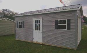 weaver-barns-portable-garage-shed-vinyl-siding-metal-roof-943x576